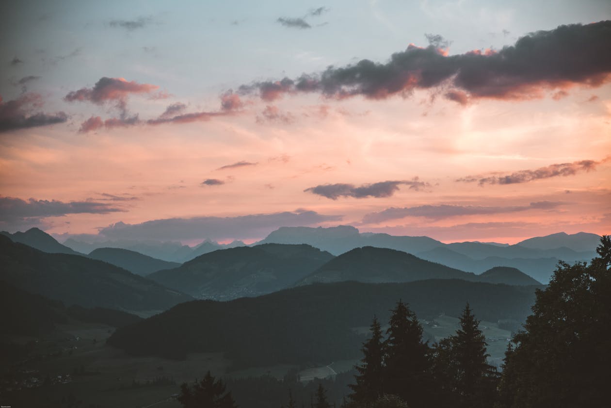 Layered mountain ridges at sunset